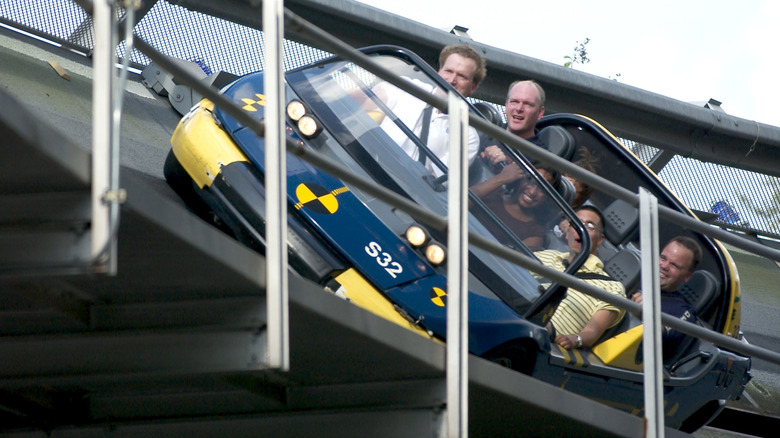 men riding test track 