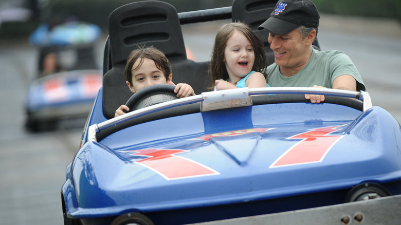 tomorrowland speedway smiling dad and kids