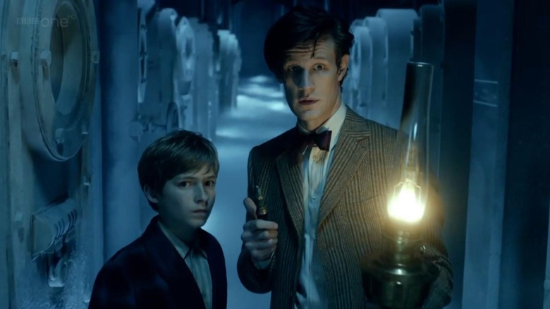 The Doctor shines a lamp