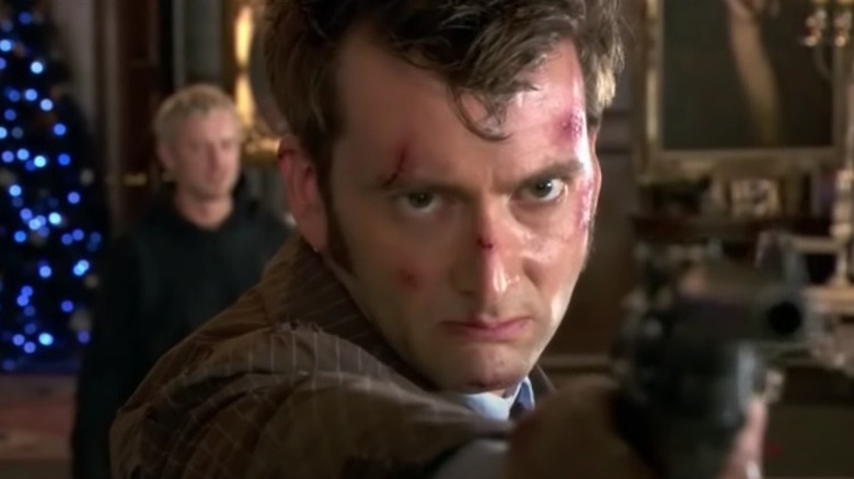 David Tennant aims gun