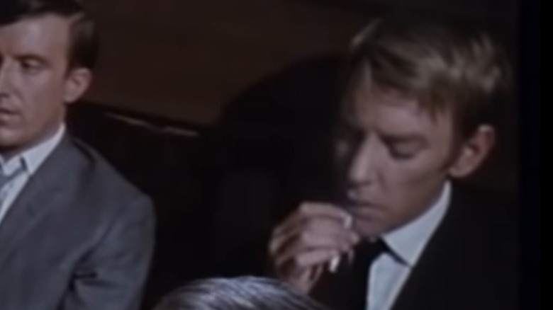 Donald Sutherland smoking