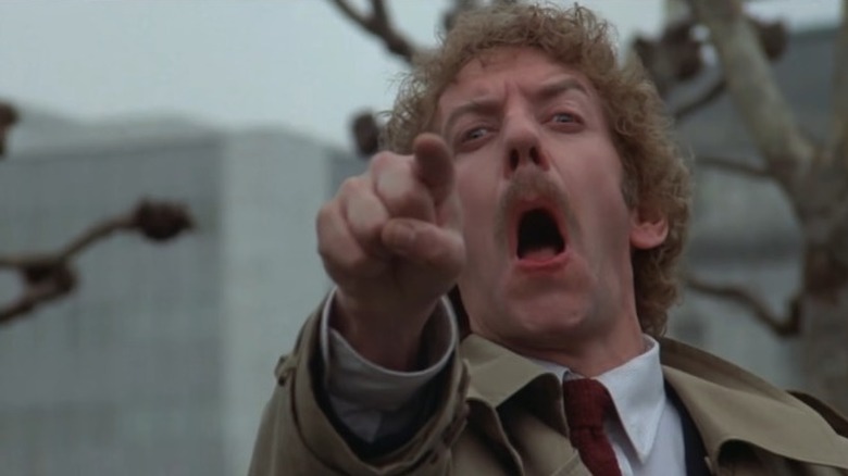 Donald Sutherland pointing and screaming