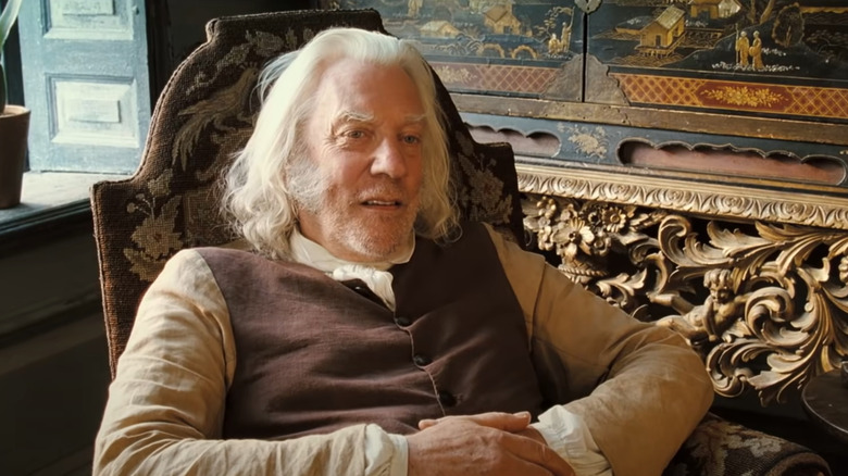 Donald Sutherland reclining in chair