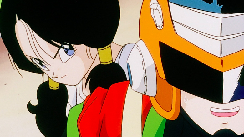 Videl suspiciously regards a smiling Great Saiyaman