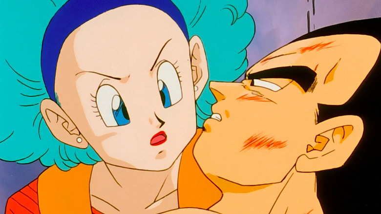 Bulma looking worried at a bruised Vegeta