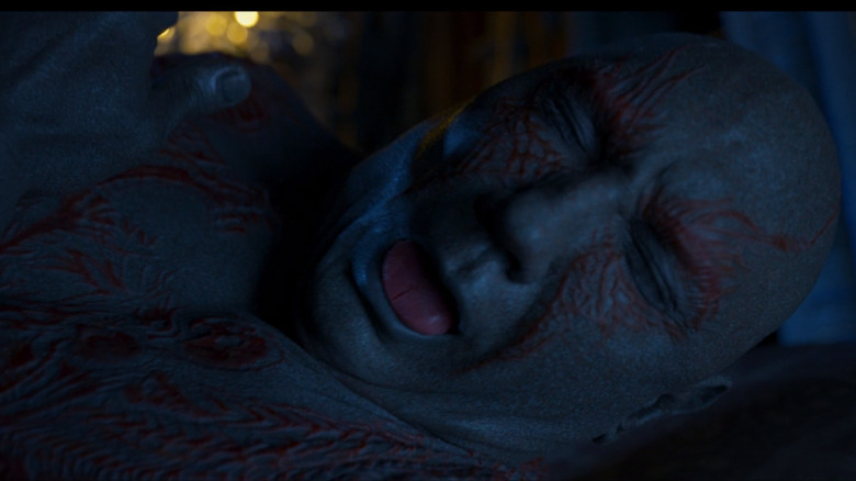 Drax making a gagging face