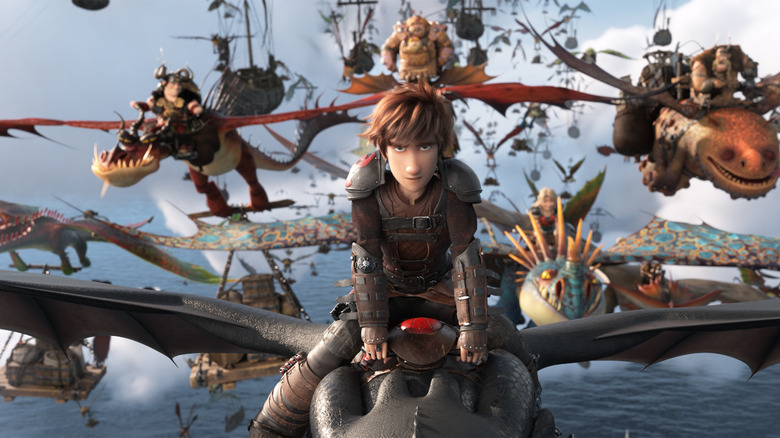 Hiccup riding with an army of dragons