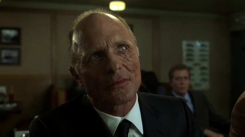 Ed Harris glares with one eye