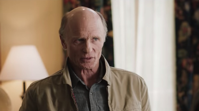 Ed Harris chats in a hotel