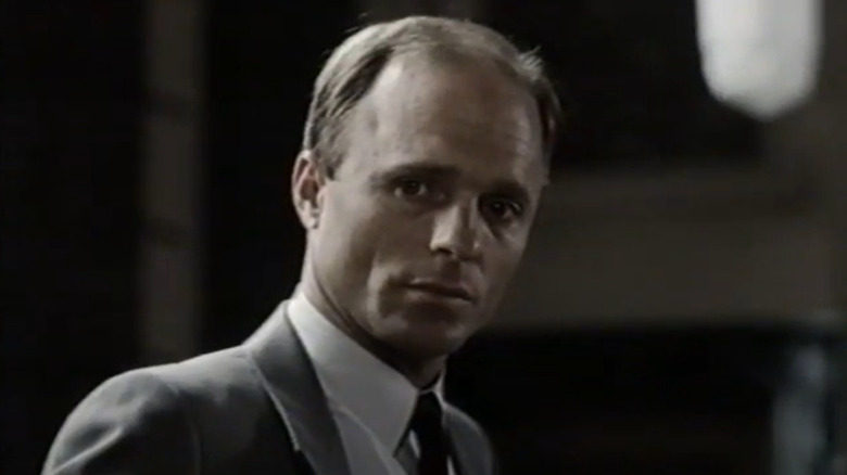 Ed Harris in a suit