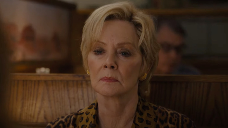 Deborah Vance scowling in diner booth