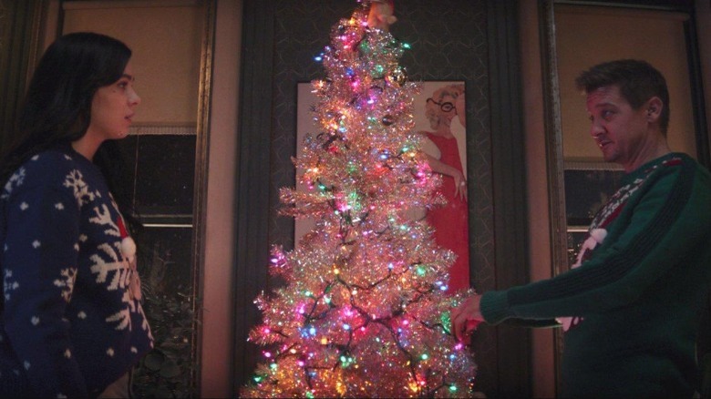 Clint and Kate with an artificial Christmas tree Hawkeye