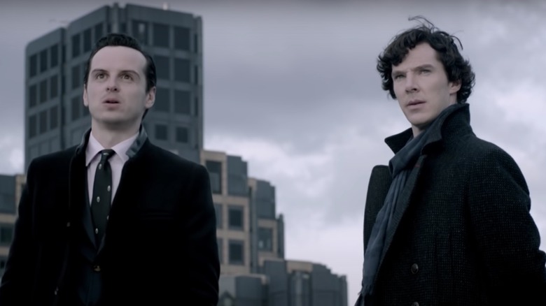 Moriarty and Sherlock against skyline