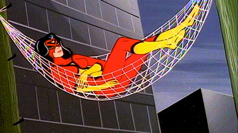 Spider-Woman in web hammock 