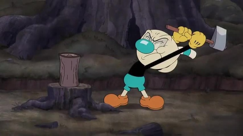 Mugman chopping wood