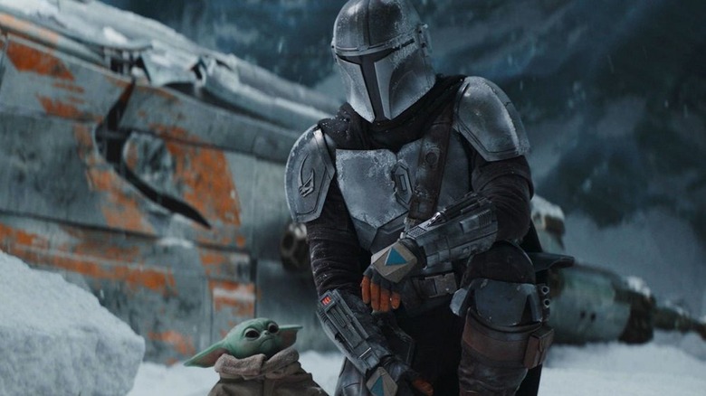 Mandalorian and child ice planet