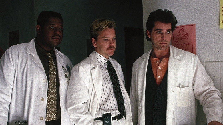 Three doctors in white coats