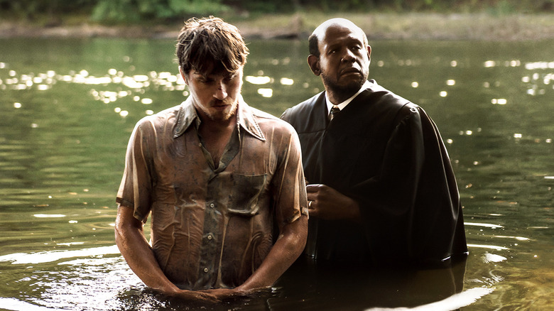 Reverend Kennedy performing a baptism