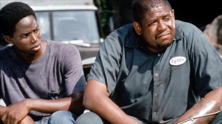 Cryus sitting with his son