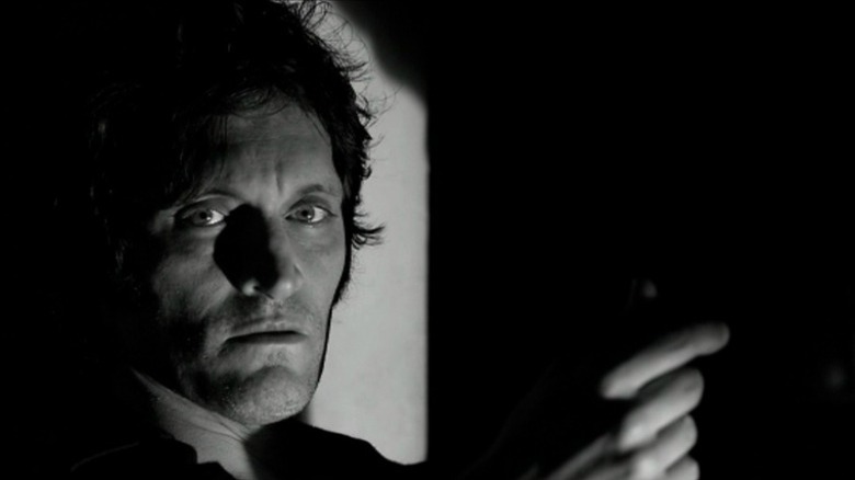 Stern-looking Vincent Gallo in black and white