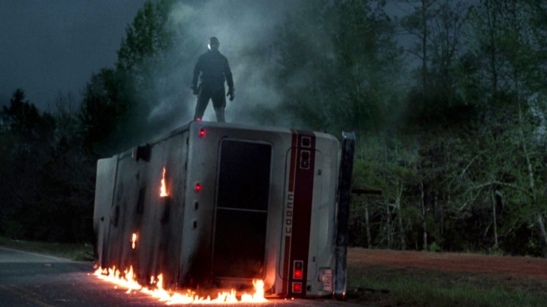 Jason stands on top of a burning camper in Friday the 13th Part VI: Jason Lives (1986)