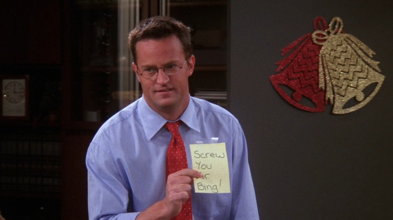Chandler Bing holding note