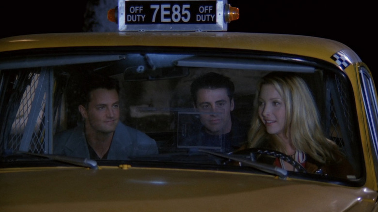 Chandler, Joey, and Phoebe in taxi