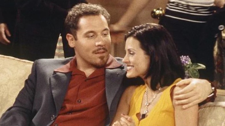 Pete holding Monica on friends