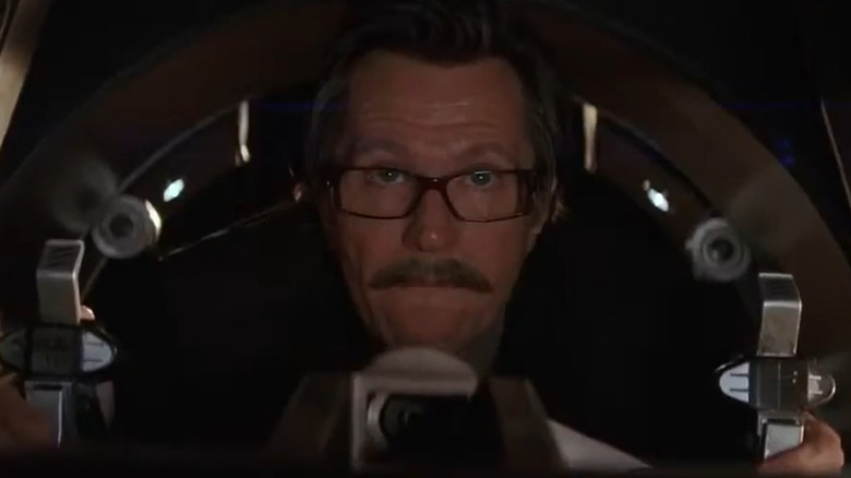 Jim Gordon drives the Batmobile