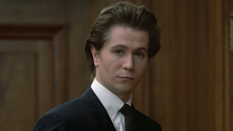 Gary Oldman wears a suit