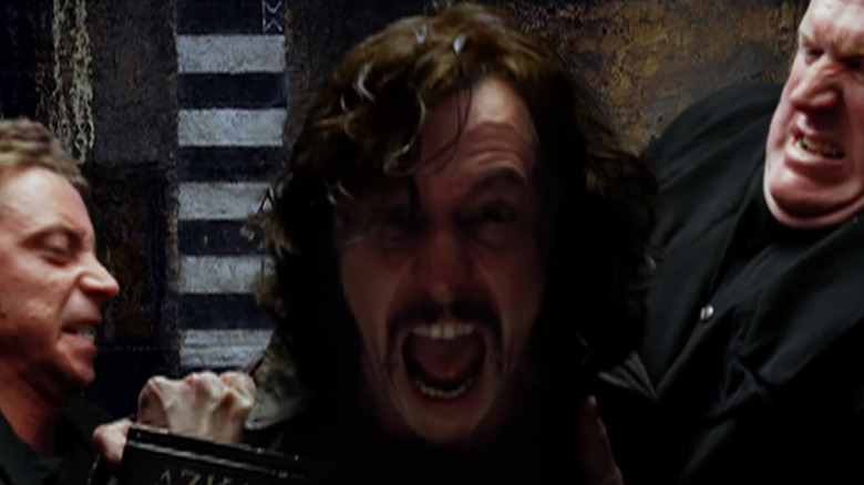 Sirius Black screams as he is grabbed