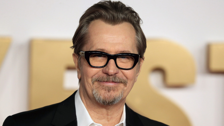 Gary Oldman smiles