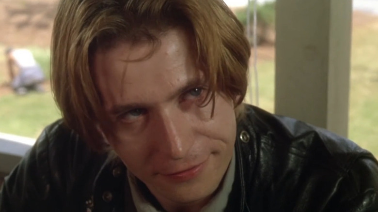 Gary Oldman wears a leather jacket