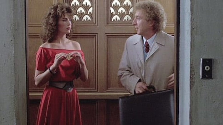 Wilder and LeBrock in an elevator