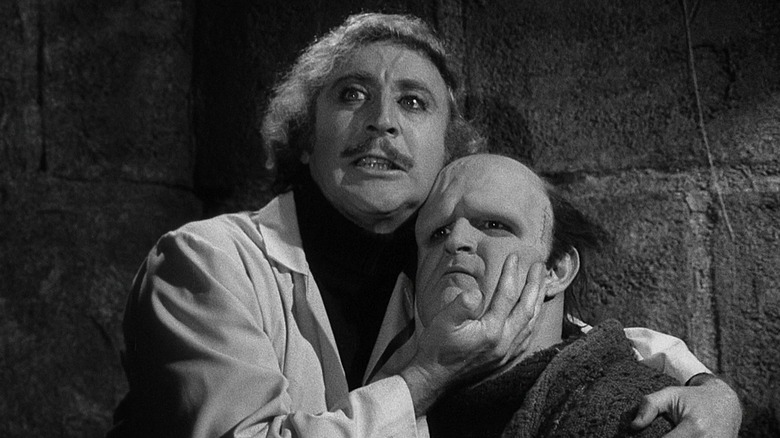 Gene Wilder holds Peter Boyle