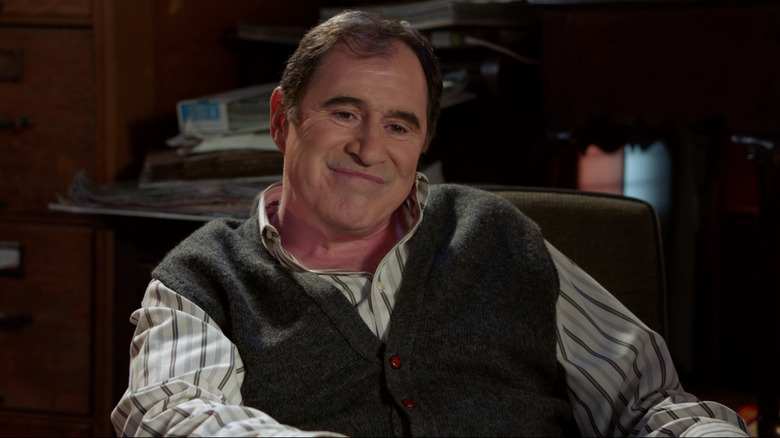 Richard Kind sitting smiling