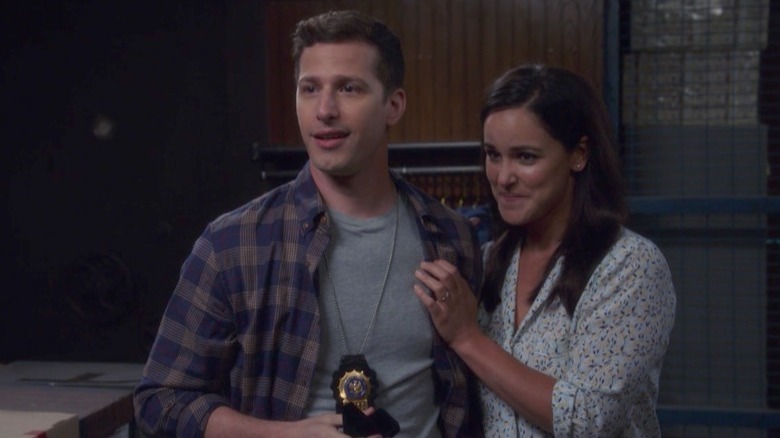 Jake Peralta and Amy Santiago smile