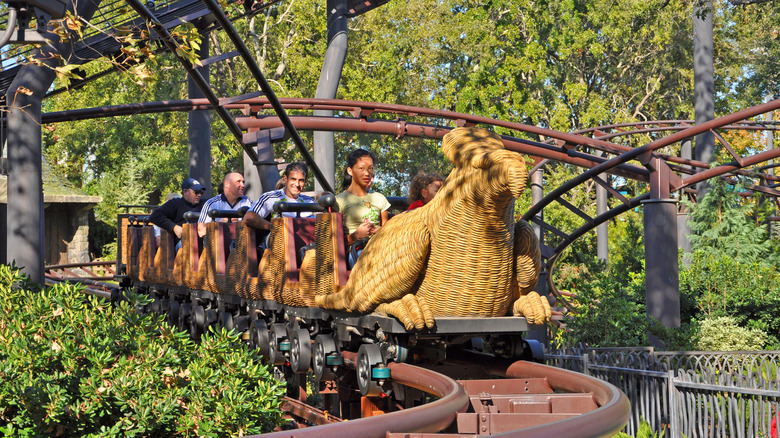 Tourists on Flight of the Hippogriff ride