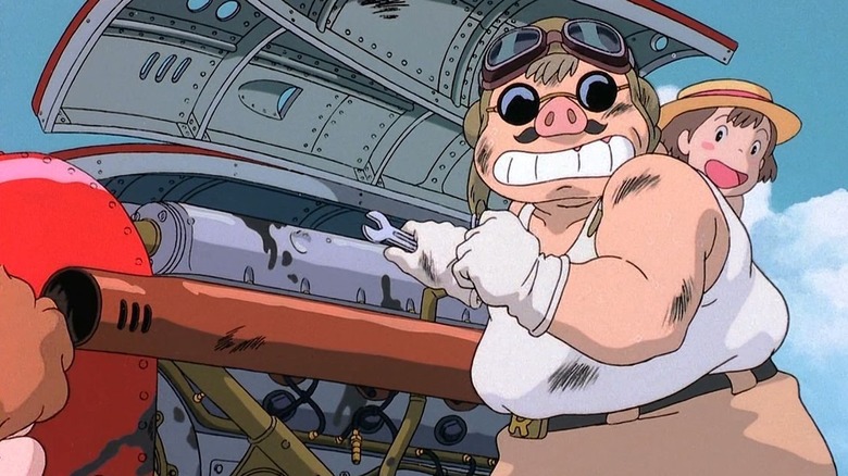 Porco works on his aircraft