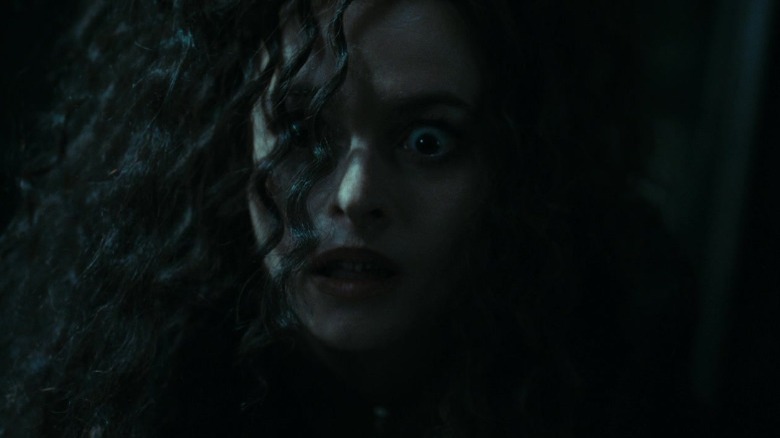 Close-up of Bellatrix with wild hair and wild eyes