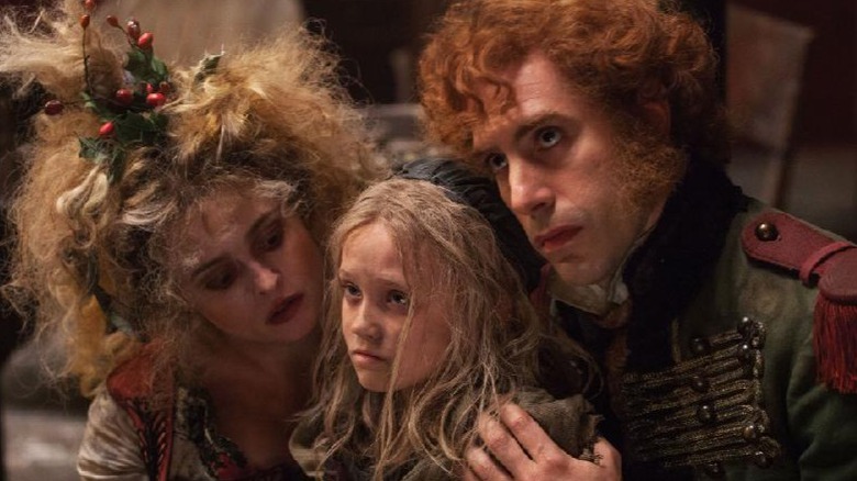 The Thenardiers grabbing Cosette