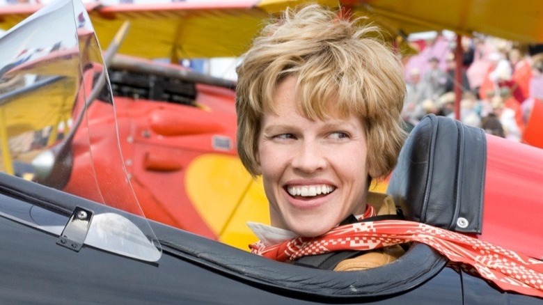 Hilary Swank as Amelia Earhart in a plane