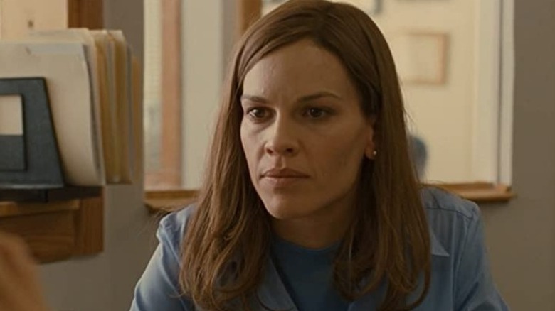 Hilary Swank in an office