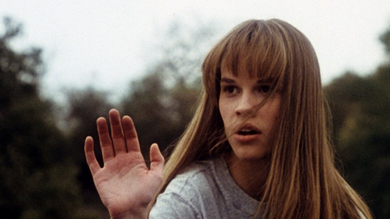 Young Hilary Swank practicing karate