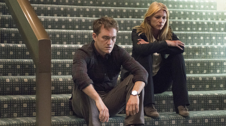 Max Piotrowski Carrie Mathison sitting stairs