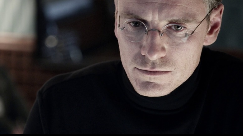 Steve Jobs looking at his computer screen intently