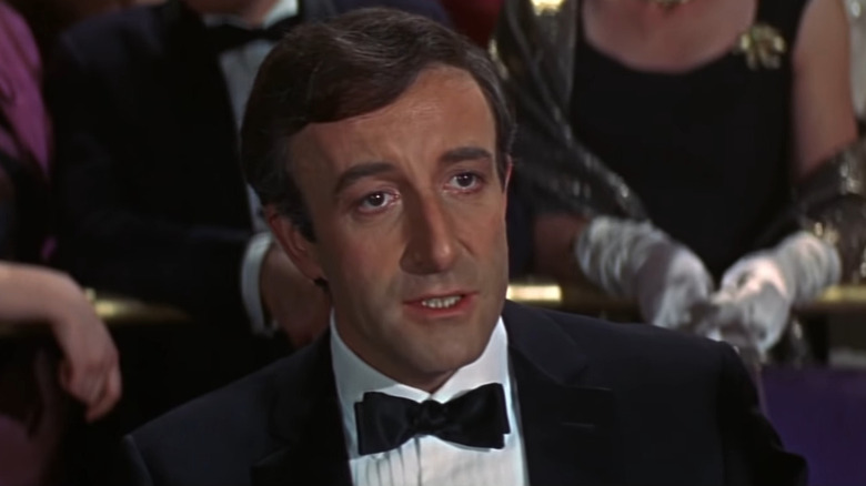 Peter Sellers smirks