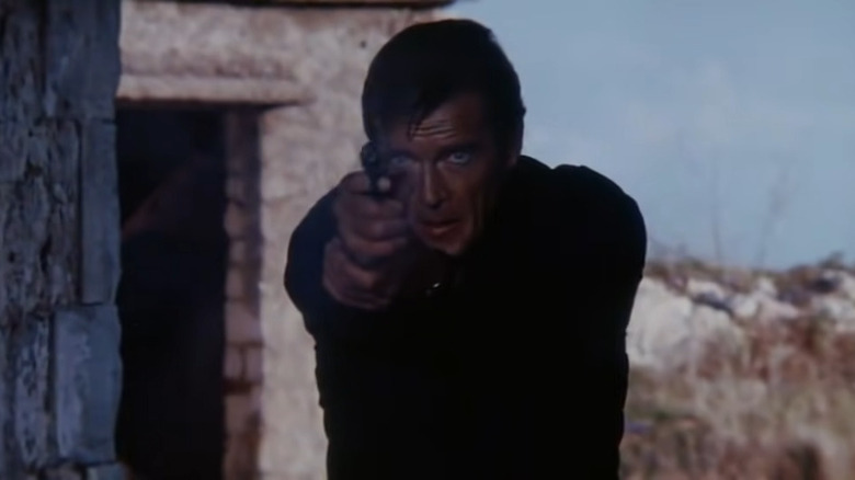James Bond aims gun