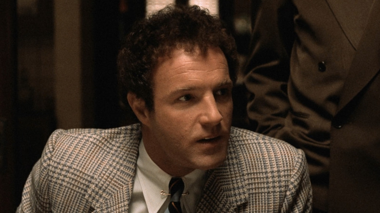 Sonny Corleone wearing checked suit