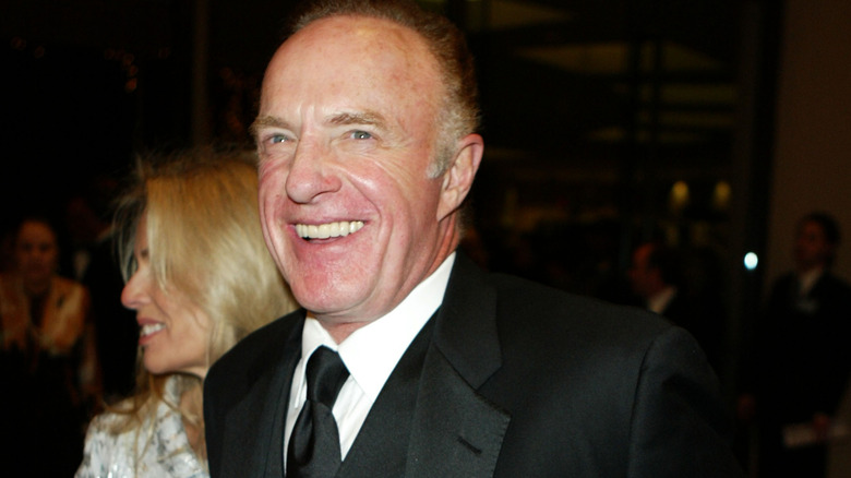 James Caan wearing black suit